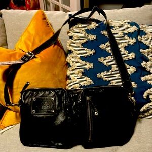 This is rare Gucci throw over shoulder bag. It’s a nice size.
